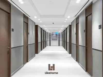 an empty corridor in a building with doors and ceilings at NEXT TO BURJ AND DUBAI MALL 2 BR BEST LOCATION in Dubai