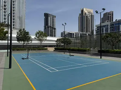 a tennis court in the middle of a city at The Grand Majestic Sky Luxe 1BR Sleeps 4 06 in Dubai