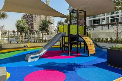 a playground with a slide in a building at Airstay - Stylish Studio - Spacious Balcony - Monthly Offer Available! in Dubai