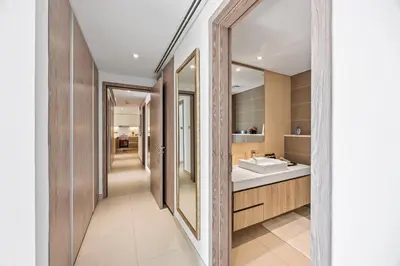 a bathroom with a sink and a mirror at Trendy Marina 2-Bedroom Apartment in Dubai