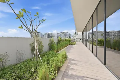 a walkway on the side of a building at New Stylish Apartment, Metro 5min walk, Dubai Marina 20min in Dubai