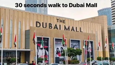 a building with a sign that reads the dublin mall at High floor downtown apartment opposite Dubai Mall in Dubai