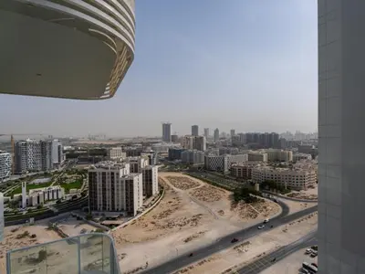 a view of a city from a building at Opalz Solace Cozy Luxe Studio 03 in Dubai