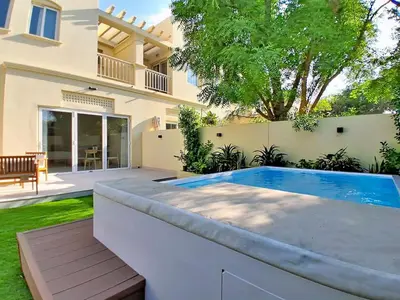 a swimming pool in the backyard of a house at Vacationer l Opulent 2 Bedroom Villa l Private Plunge Pool in Dubai
