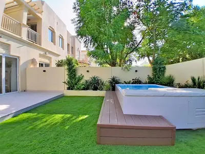 a hot tub in the backyard of a house at Vacationer l Opulent 2 Bedroom Villa l Private Plunge Pool in Dubai