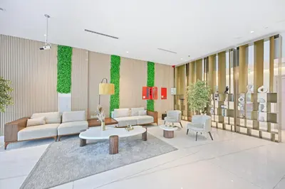 a rendering of a living room with furniture and plants at Bloomfields Comfort Studio at Bali Residence, DXB in Dubai