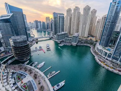 a view of a river in a city with buildings at Luxury Views at The Address Dubai Marina in Dubai