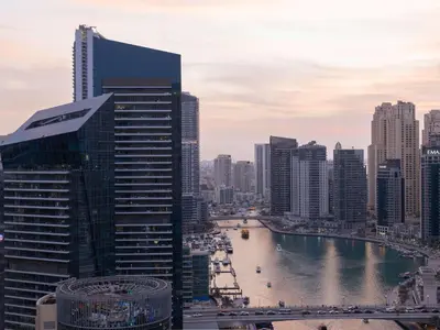 a view of a city with a river and buildings at Luxury Views at The Address Dubai Marina in Dubai
