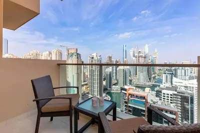 a balcony with a view of a city skyline at Marriott 1BR Apartment with Dubai Marina View in Dubai