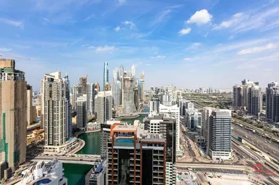 an aerial view of a large city with buildings at Marriott 1BR Apartment with Dubai Marina View in Dubai