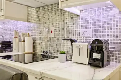 a coffee maker on a counter in a kitchen at Ahlan Marhaba Marina JBR in Dubai