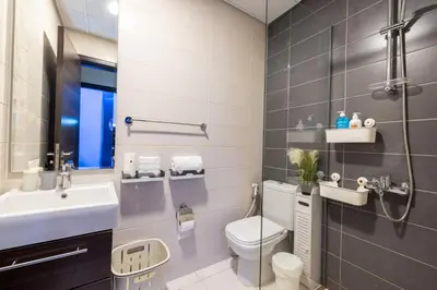 a bathroom with a toilet and a sink at 3-Bedroom Cozy Townhouse with great amenities in Dubai in Dubai
