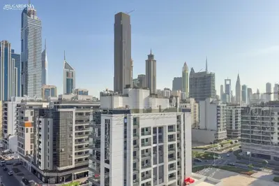 a view of a city skyline with tall buildings at Near Museum of the Future - Homey Apartment-Jumeirah Garden in Dubai