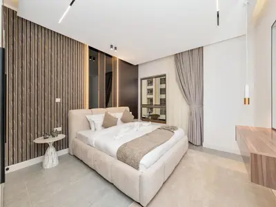 a bedroom with a large bed and a large window at 4 BHK JBR BEACHFRONT# Next to Dubai Eye# Marina View in Dubai