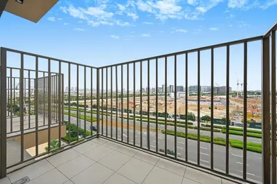 a view from the balcony of a building at Socio Tower Apt - Parking, Balcony&Pool - by Rentujemy in Dubai
