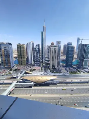 a view of a city with tall buildings at Spacious Master Bedroom with Balcony Horizon Tower, Dubai Marina in Dubai