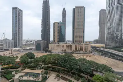 a view of a city with tall buildings at Premium 1BR in Downtown & Direct Access to Metro in Dubai