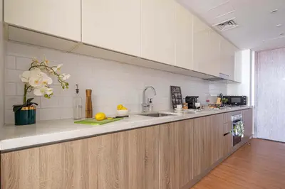 a kitchen with a sink and a counter at Frank Porter - Liv Residence in Dubai