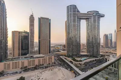 a view of a city with tall buildings at Burj Vista Modern Comfort - 1BR with Pool, Gym and Scenic views in Dubai