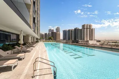 a swimming pool on the roof of a building at Trillionaire Bayhouse Chic Studio - Jacuzzi with views, Pool and Gym in Dubai