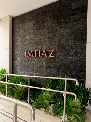 a sign for the entrance to an india z company at Stylish new apartment with Burj and Downtown views in Dubai