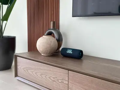 a vase sitting on top of a wooden dresser at Silkhaus Luxury New Tower in City Walk in Dubai