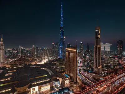 a view of a city at night with traffic at Downtown Views Suites by Prestige Nest in Dubai