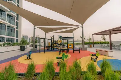 a playground in a building with a play area at Peaceful and Cozy Studio, Burj Khalifa View in Dubai