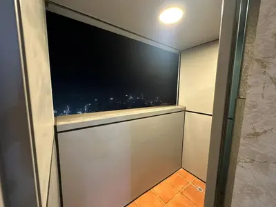 a window in a room with a view of a city at Marina Sea View Room Dubai in Dubai