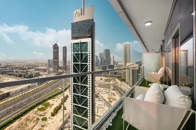 a view of a city from the balcony of a skyscraper at Famous Sky Pool at Paramount's King's 2BR in Dubai