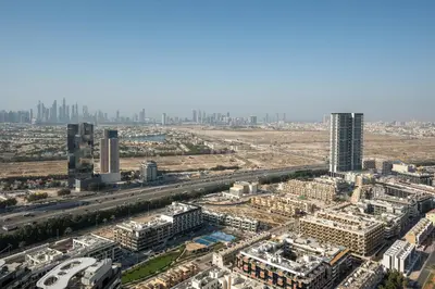 an aerial view of a city with tall buildings at High-Floor Apartment with Balcony Pool in Dubai