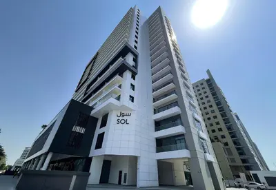 a tall building with the words you so on it at High-Floor Luxe 1BR - Burj Khalifa View - Business Bay in Dubai