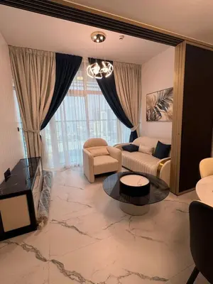 a living room with a couch and a table at Opalz 1 bhk luxury apt for family and couple with swimming pool in Dubai