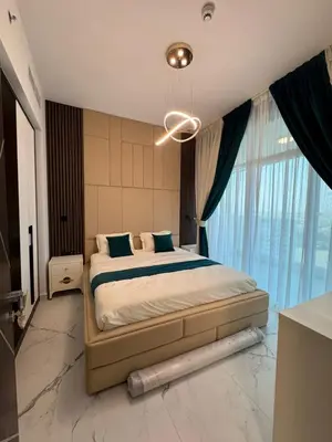 a bedroom with a bed and a large window at Opalz 1 bhk luxury apt for family and couple with swimming pool in Dubai
