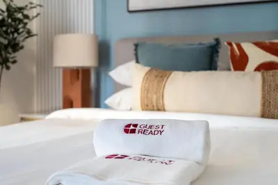 a hotel room with two towels on a bed at GuestReady - 1BR | JLT Apt near Metro Station in Dubai