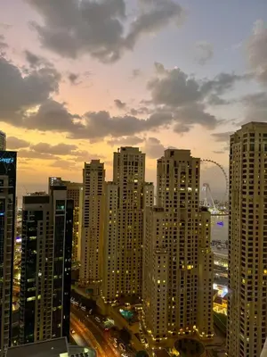 a view of a city skyline with tall buildings at Sky-High Luxury 1BR Best Views of Dubai Marina Emaar 39th Floor in Dubai