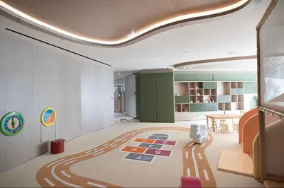 a living room with a carpet on the floor at Vogue JVC Binghatti Phantom near Circle Mall, One Bedroom Apartment with Large Balcony and City View, Access to all Amenities in Dubai