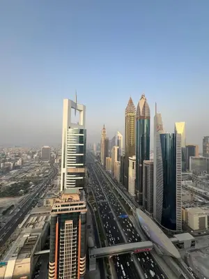 a view of a city with many tall buildings at 1BR Amazing Burj And Dubai View in Dubai