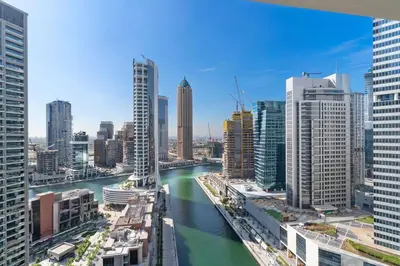 a view of a river in a city with buildings at The Smart Concierge - Peninsula One in Dubai