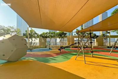a playground in a building with swings at bnbmehomes - Burj Vista Tower 1 in Dubai