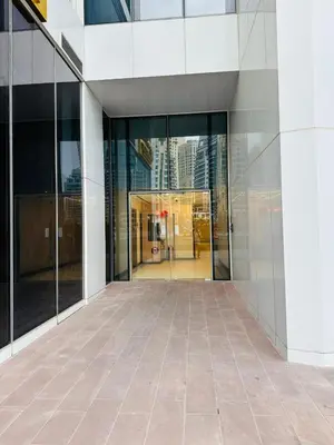 an empty building with glass doors and a tile floor at Amazing apartment on Stella Maris 2BR in Dubai