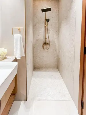 a bathroom with a shower with a shower head at Dubai Premium 2BR with Private Pool and Balcony! in Dubai