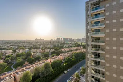 a view of the city of st louis from a building at Family-Friendly Apartment, Few Minutes Drive to Dubai Marina, Miracle Garden and Mall of the Emirates - Elite Residences 4, Sports City by Deluxe Holiday Homes in Dubai