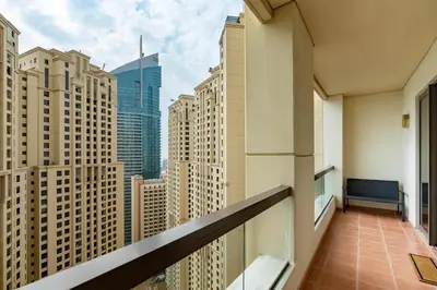 a balcony with a view of a city skyline at White Sage JBR Sadaf Large 1BR on High Floor with two balconies in Dubai