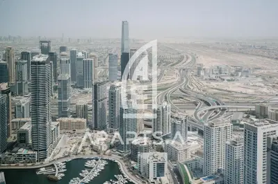 an aerial view of a city with tall buildings at 2BR Address JBR - Direct Beach Access & Top Views in Dubai