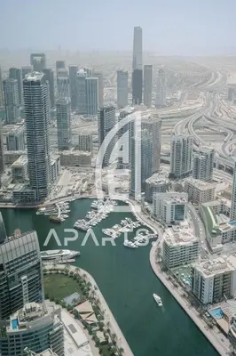 an aerial view of a city with a harbor at 2BR Address JBR - Direct Beach Access & Top Views in Dubai
