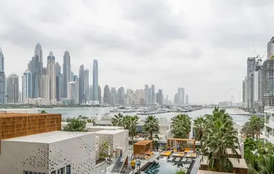 an aerial view of a city with a harbor at New Arabian Five Palm Residences in Dubai