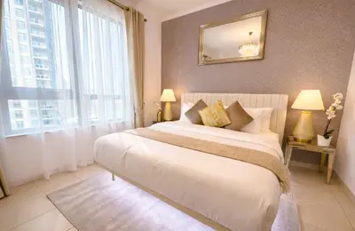 a bedroom with a large bed and a large window at Elite Royal Apartment - Sky Series - Highest Apartment Floor - Full Burj Khalifa & New Fountain View - Eternal in Dubai