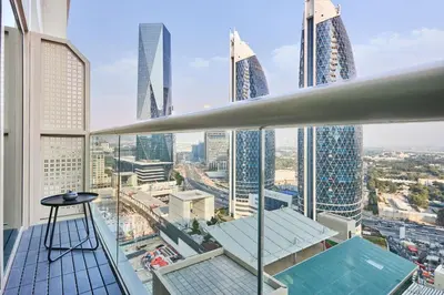 a view of the city from the balcony of a skyscraper at Stylish Studio in the Heart of DIFC in Dubai