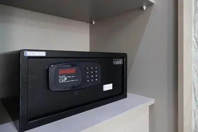 a microwave oven sitting on top of a shelf at Stylish Silicon Oasis Studio Near Mall & Airport in Dubai
